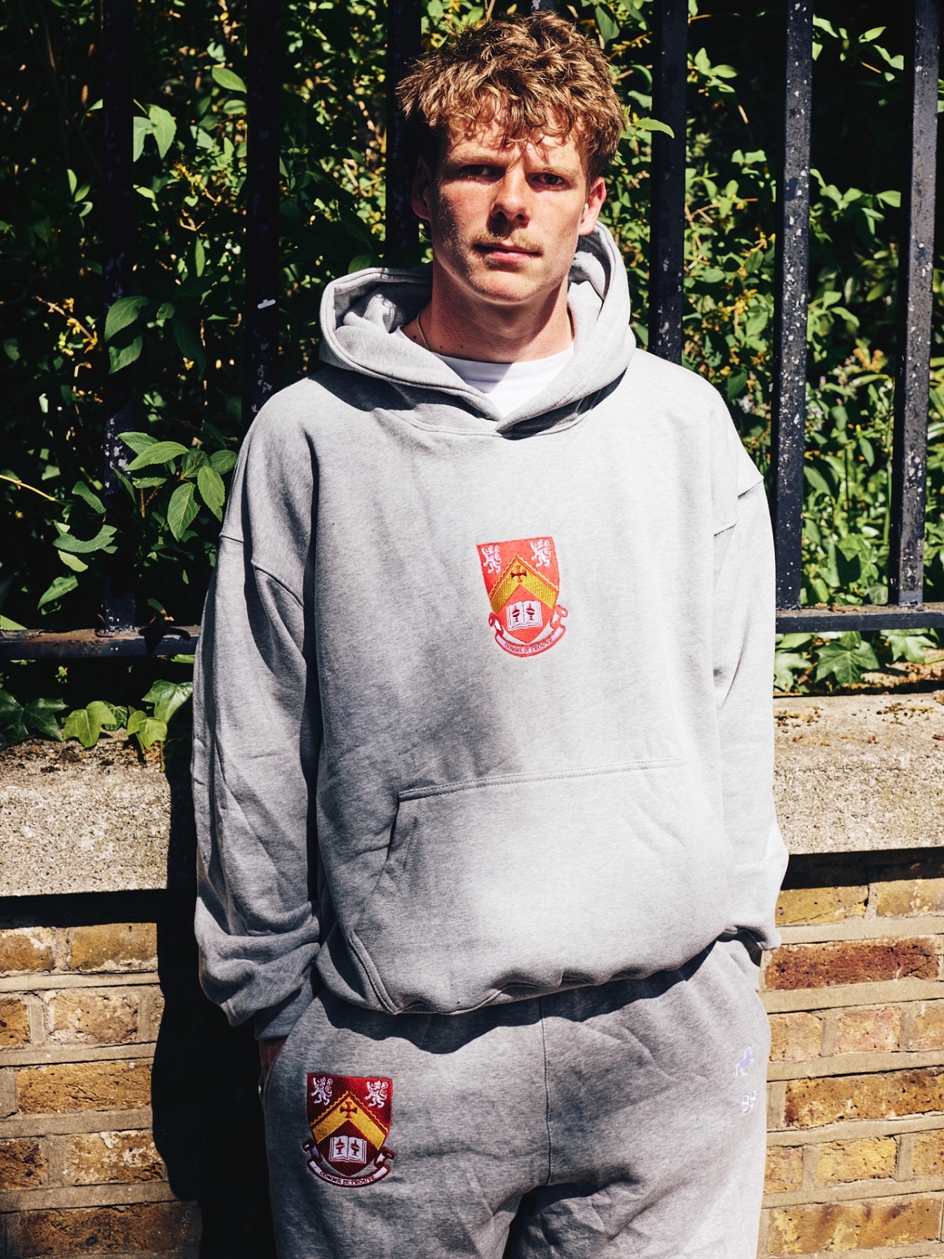grey hoodie in action