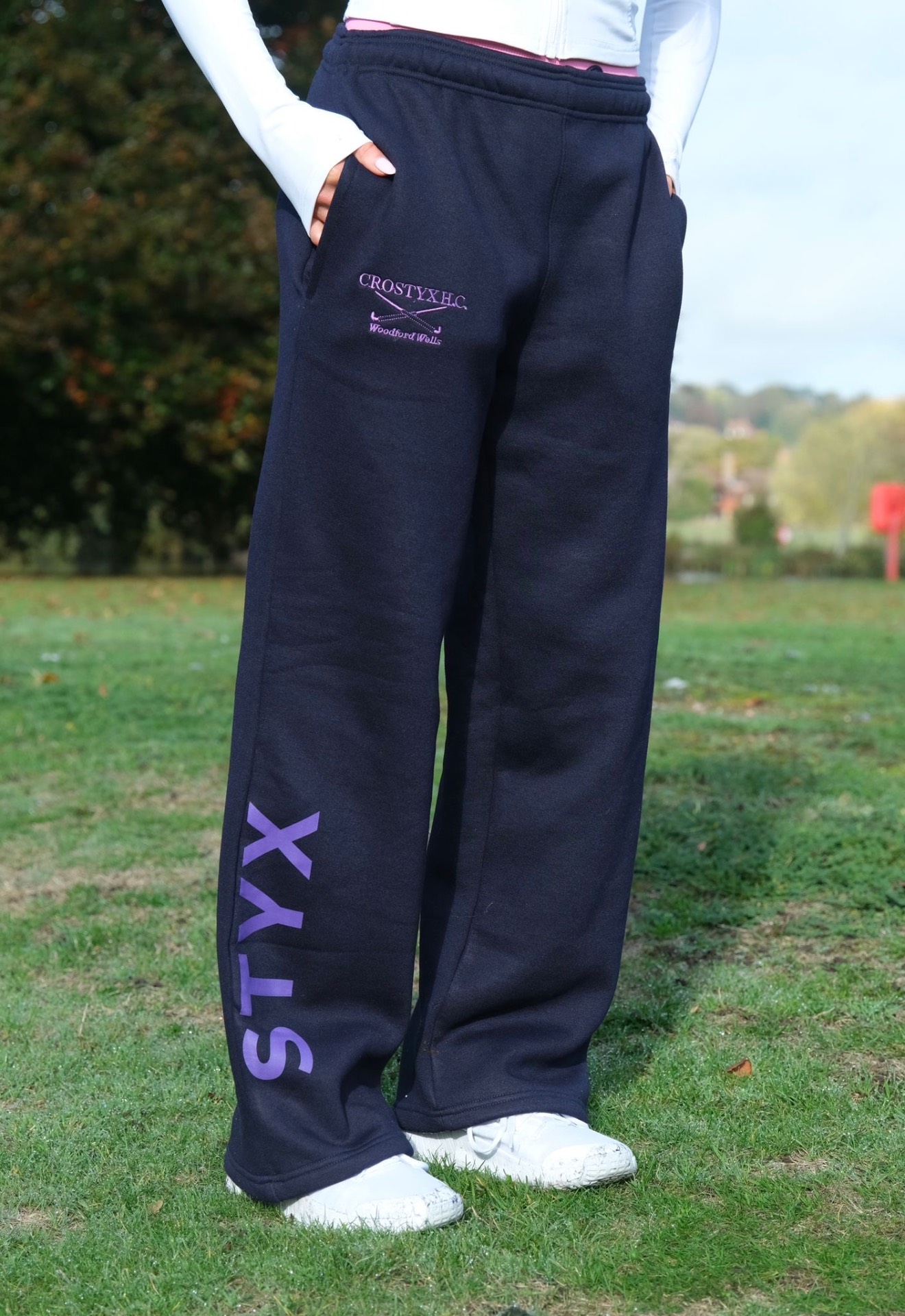 navy joggers in action