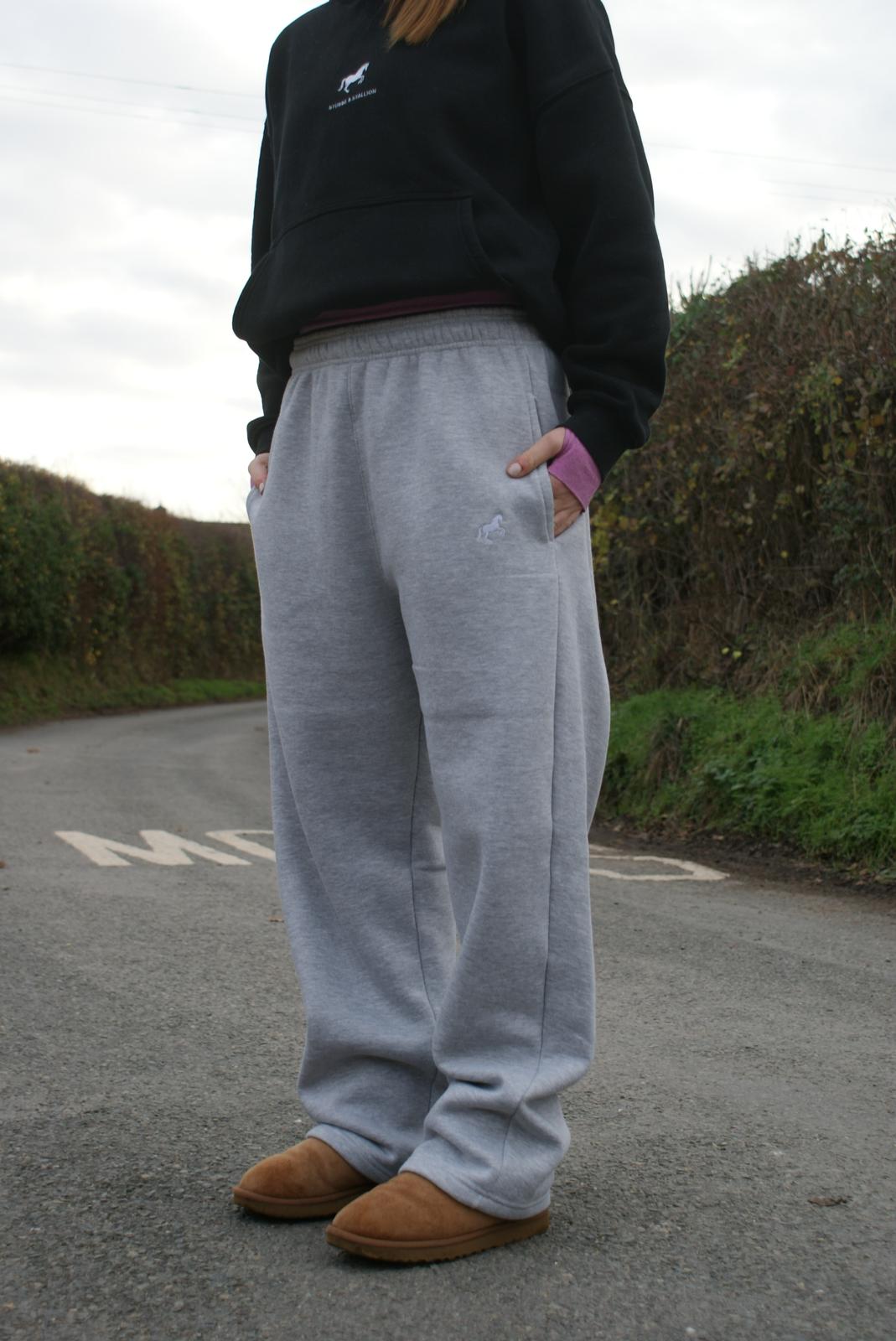 grey joggers in action